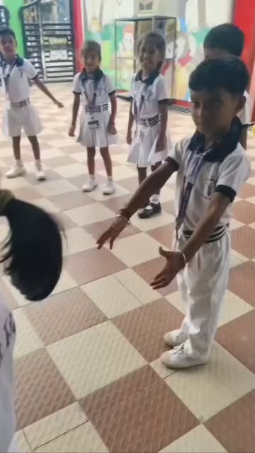 Children doing morning exercise in class